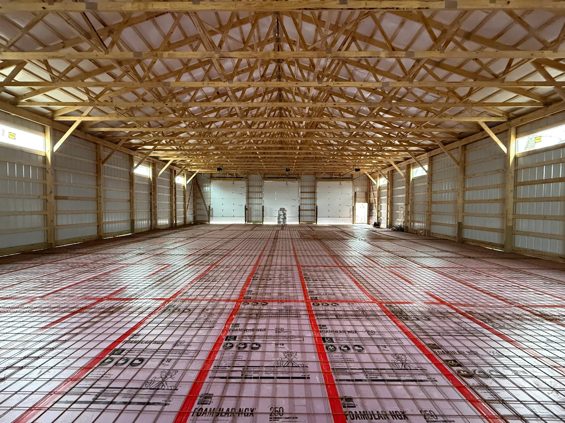 Concrete slab base preparation and grading